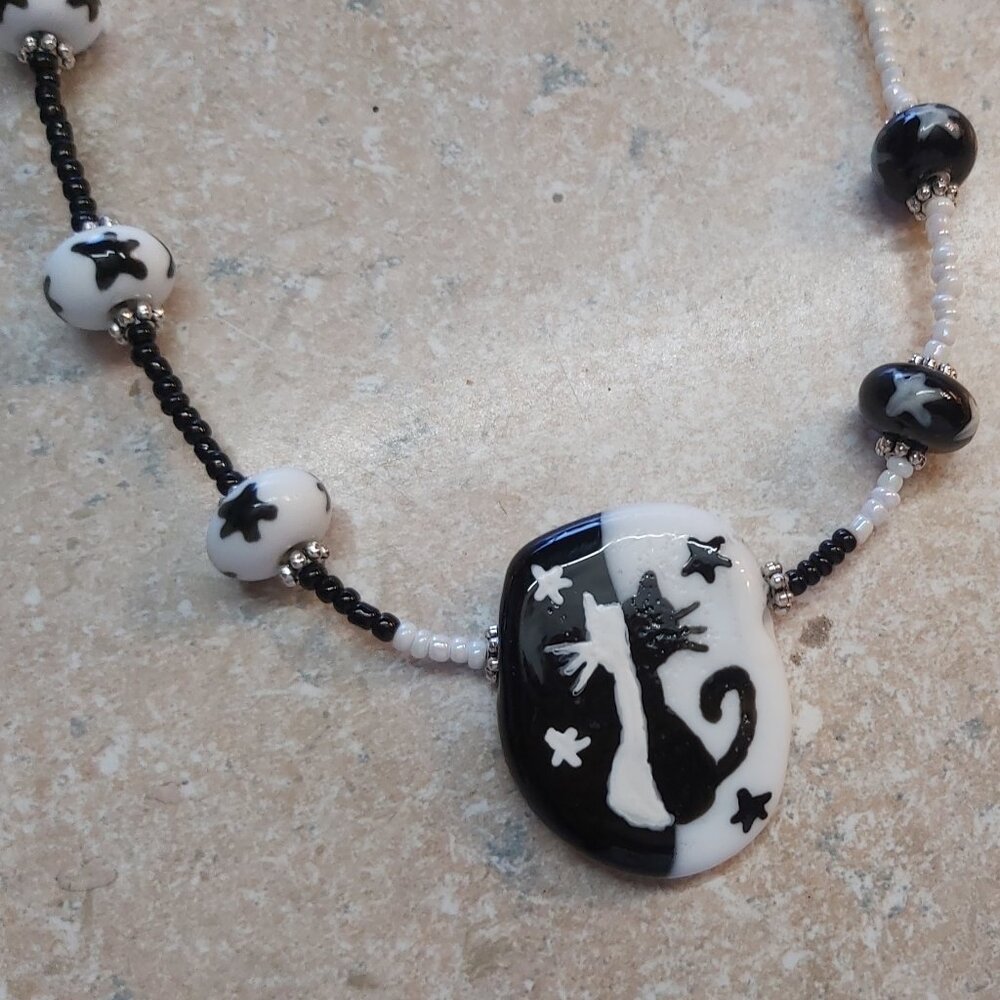 20" long Lampwork glass ncat necklace with star glass beads